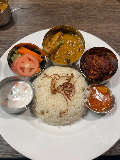 Kurumulaku Kozhi Roast at Olive South Indian Cuisine Calgary